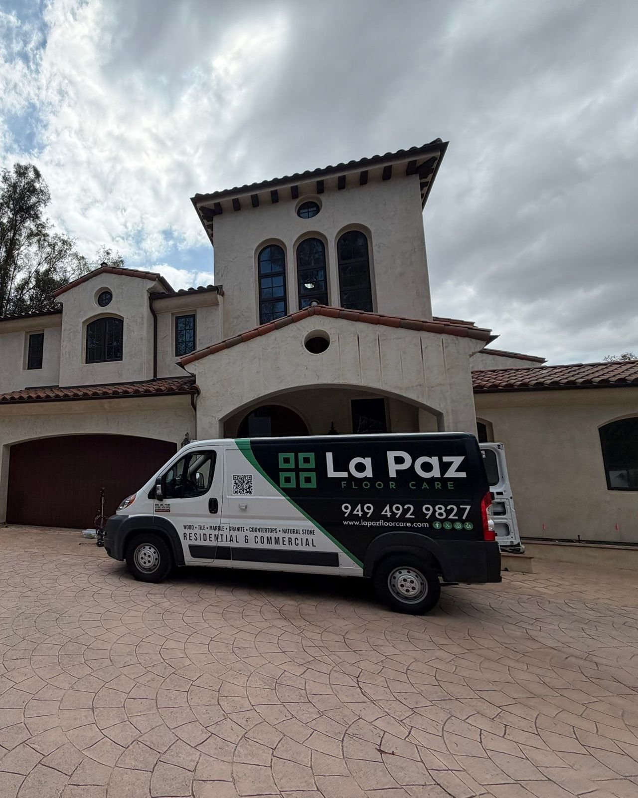 La Paz Floor Care van at a Spanish-style estate in Coto de Caza, CA