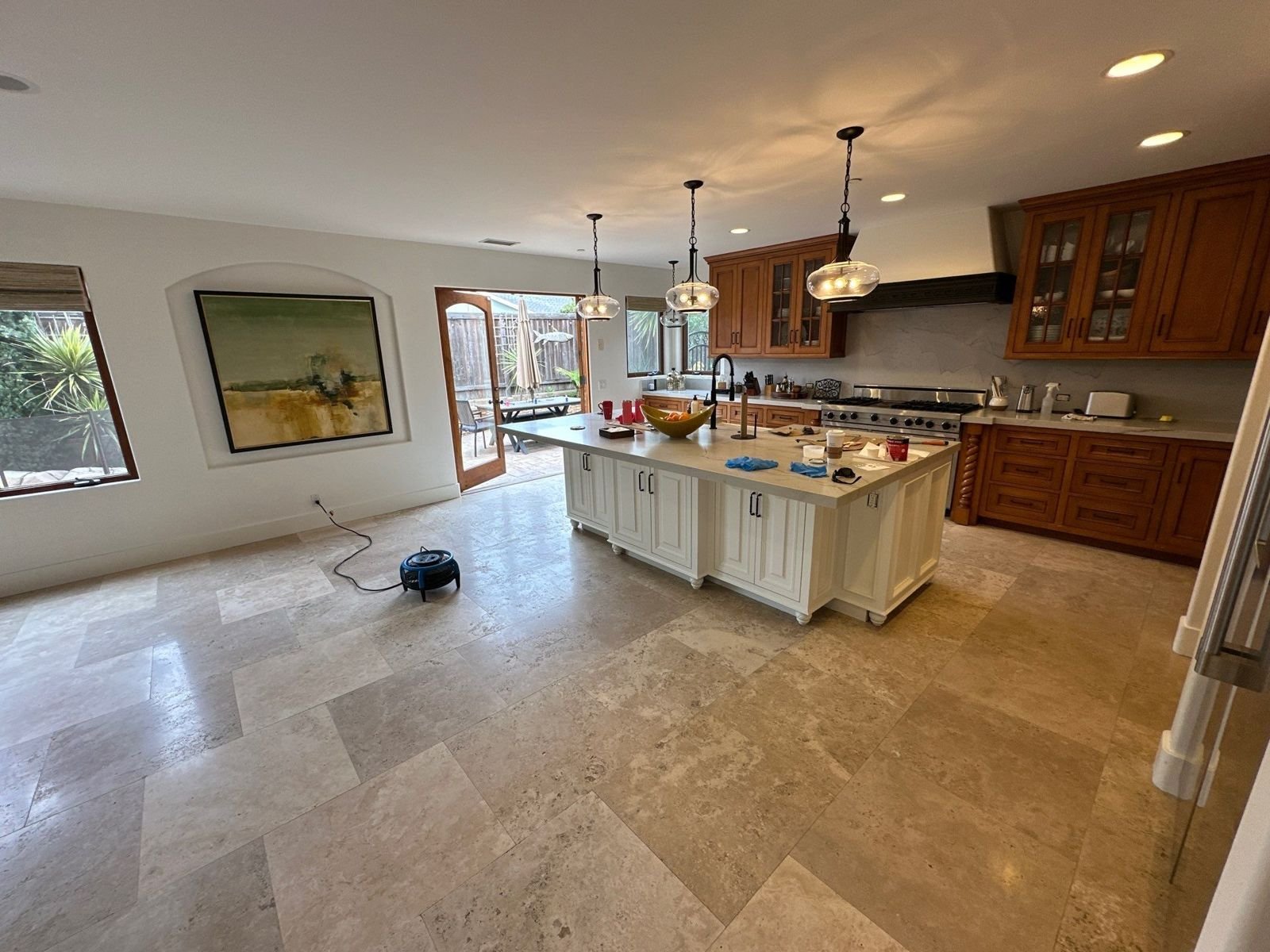 Travertine kitchen and family room floor cleaned and sealed in Dana Point, CA