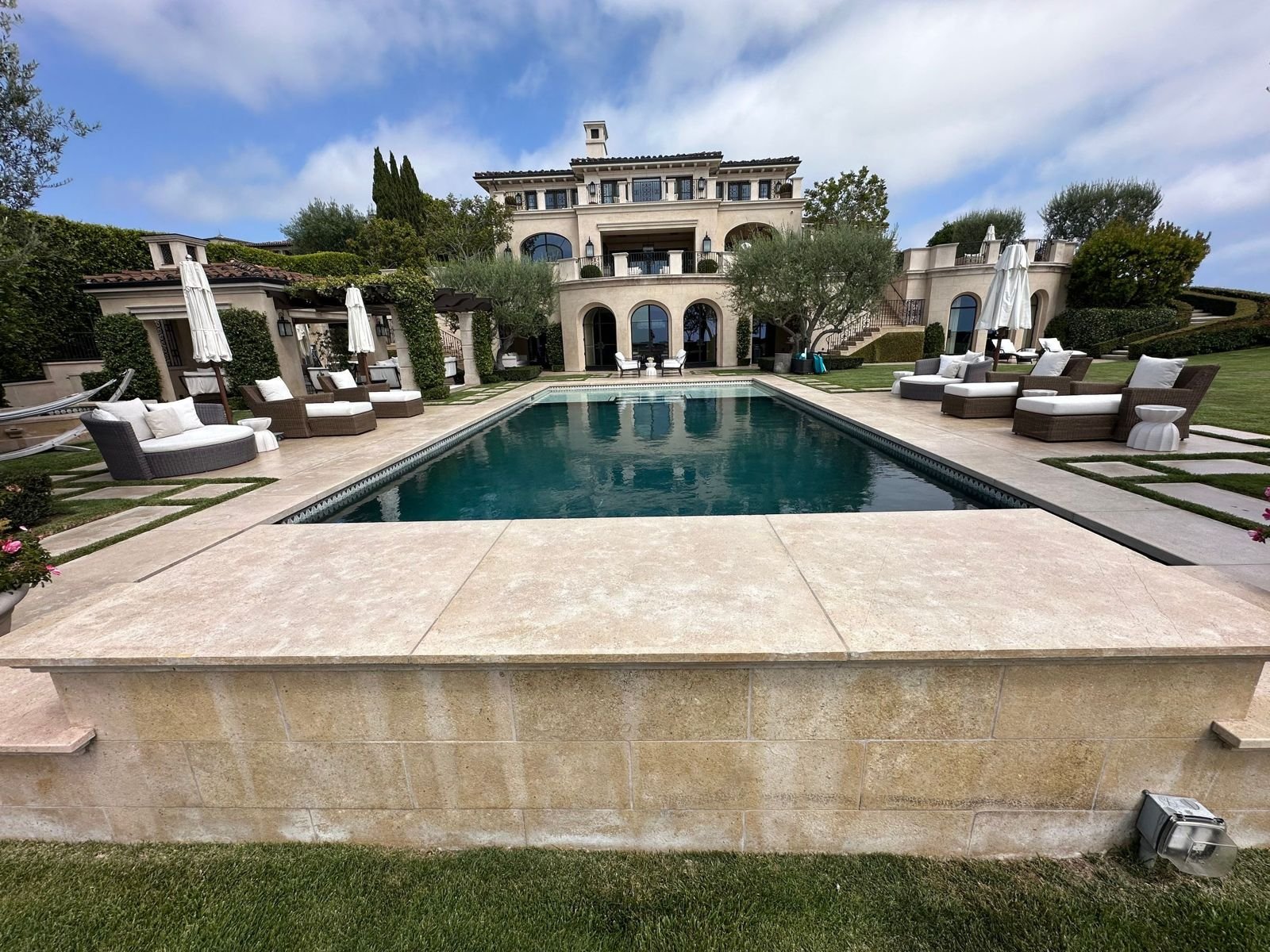 Limestone pool deck and coping cleaned at a Ladera Ranch, CA estate