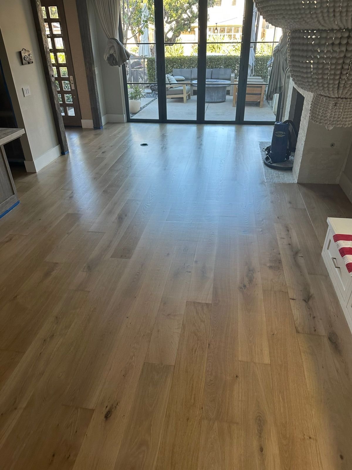 Wide-plank white oak refinished in Laguna Beach, CA