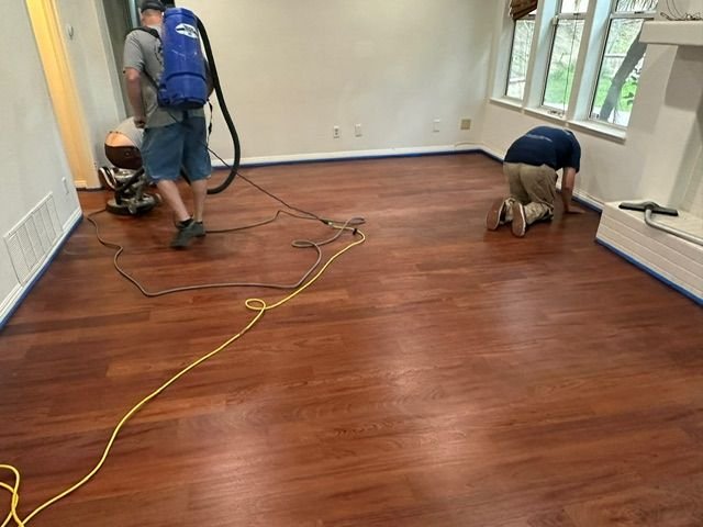 La Paz Floor Care crew sanding a hardwood floor in Laguna Hills, CA